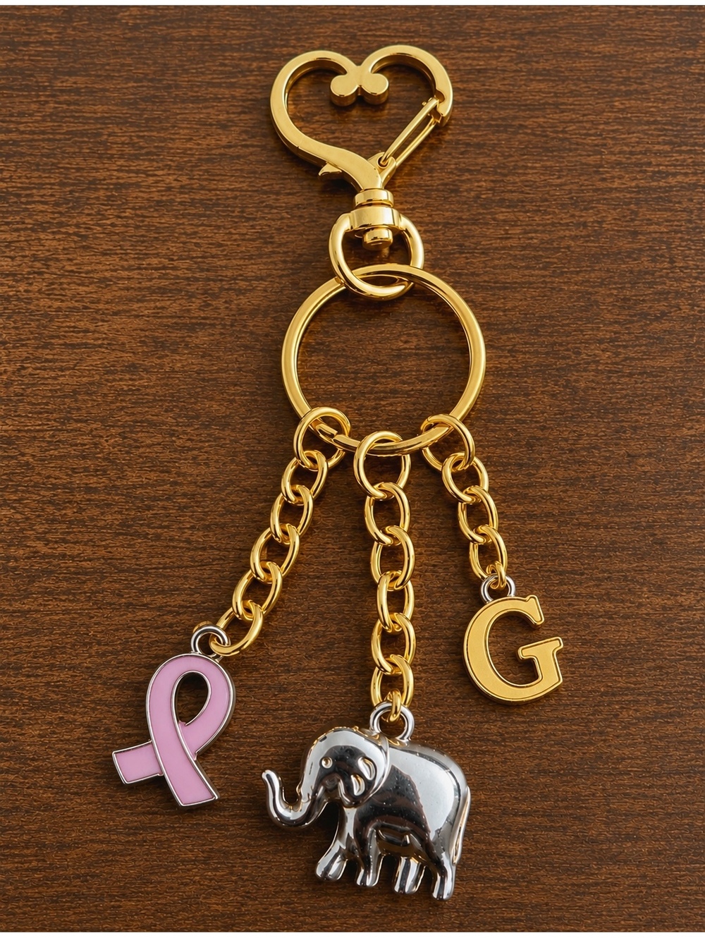 Gold Tone Keychain with Pink Ribbon, Elephant Charm, and Letter L